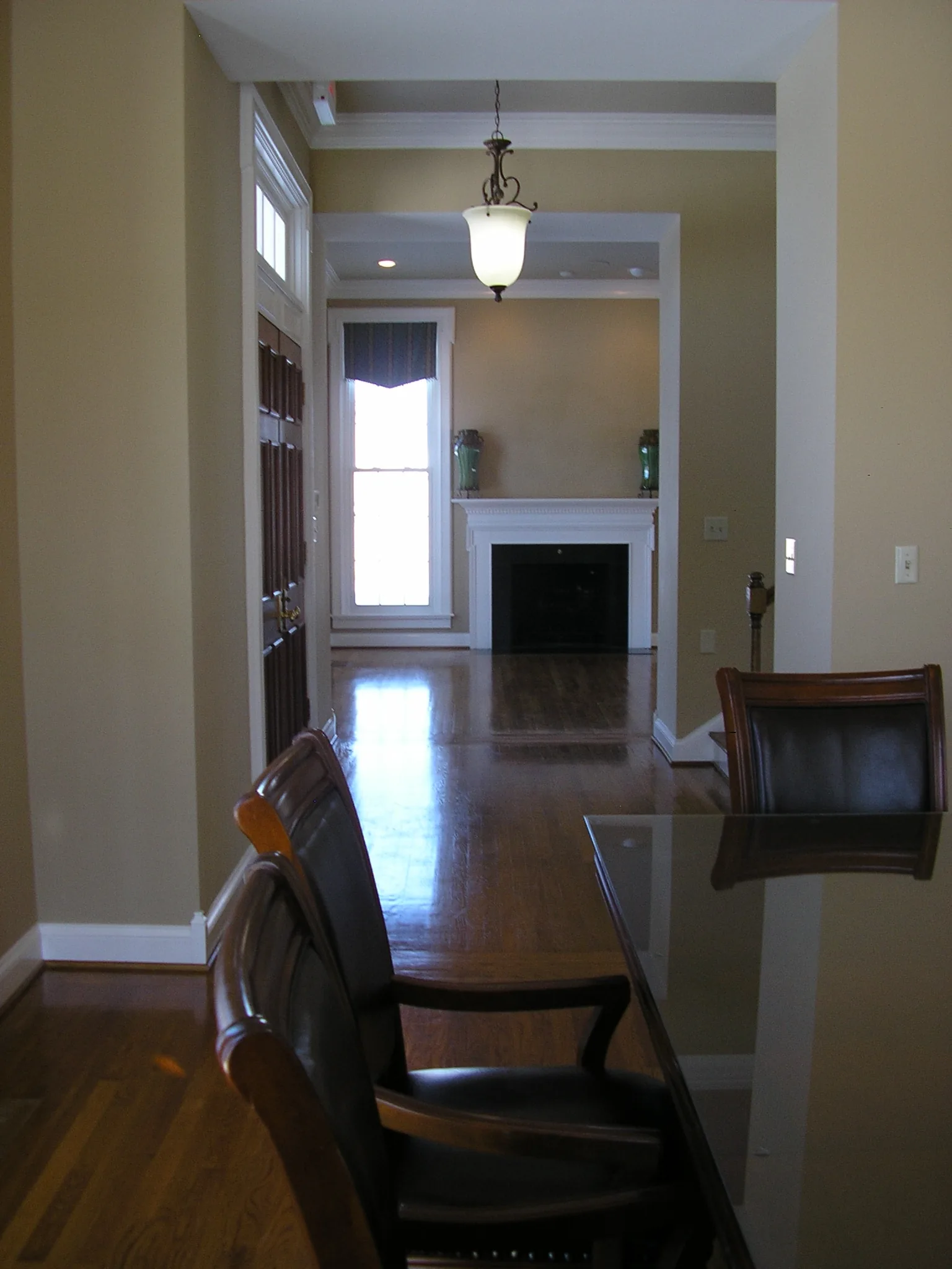 An interior doorway and adjoining room