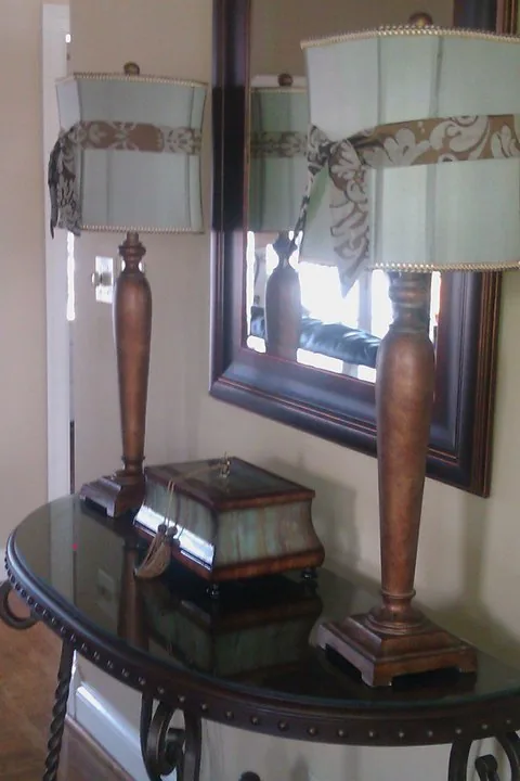 The clubhouse hallway with a high-top table beside the entry